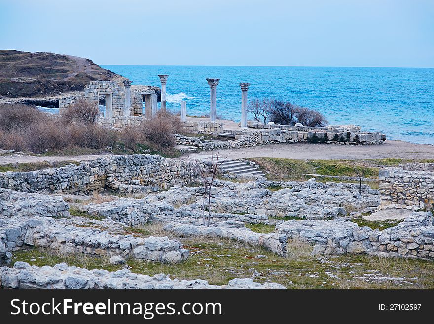 Landscape with the sea, waves and ruins of the ancient Khersones city in Crimea. Ukraine