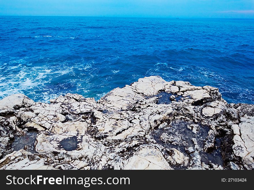 Landscapes with the clear blue sea and stony coast line. Ukraine. Crimea. Landscapes with the clear blue sea and stony coast line. Ukraine. Crimea.