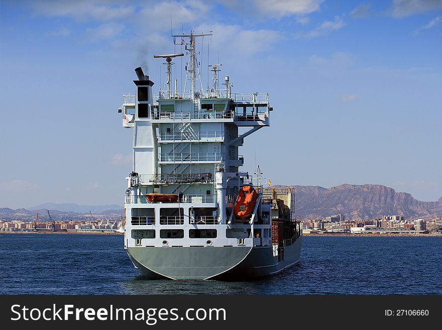 Container ship transport anchored in Alicante coast, Spain. Container ship transport anchored in Alicante coast, Spain.