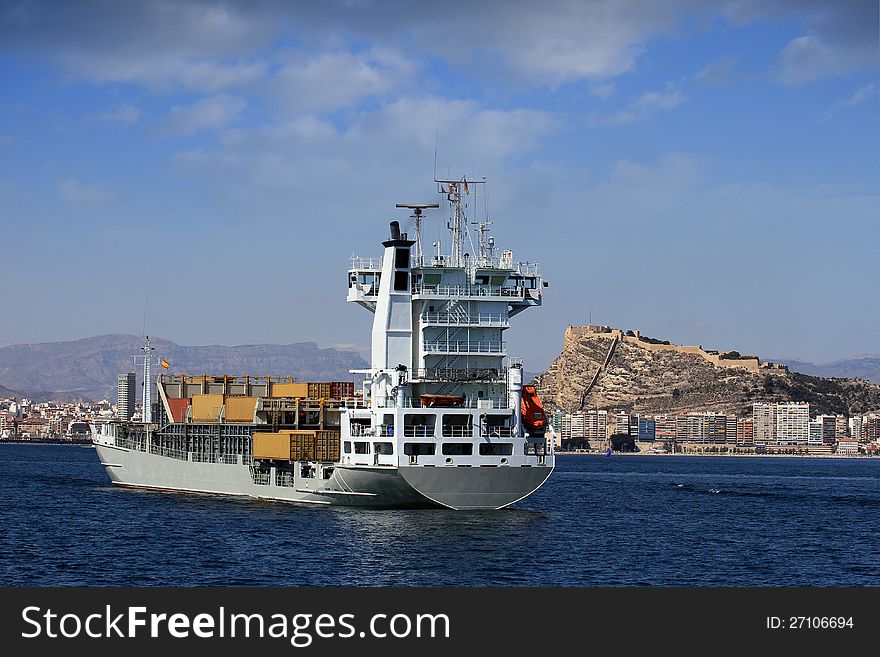 Container ship transport anchored in Alicante coast, Spain. Container ship transport anchored in Alicante coast, Spain.