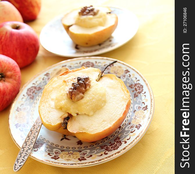 Baked apple with cottage cheese and nuts ( close up )