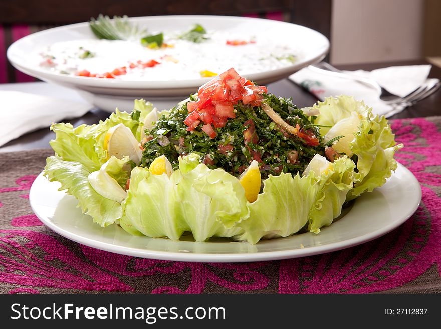Oriental Salad, green salad , lemon, tomato and vegetable