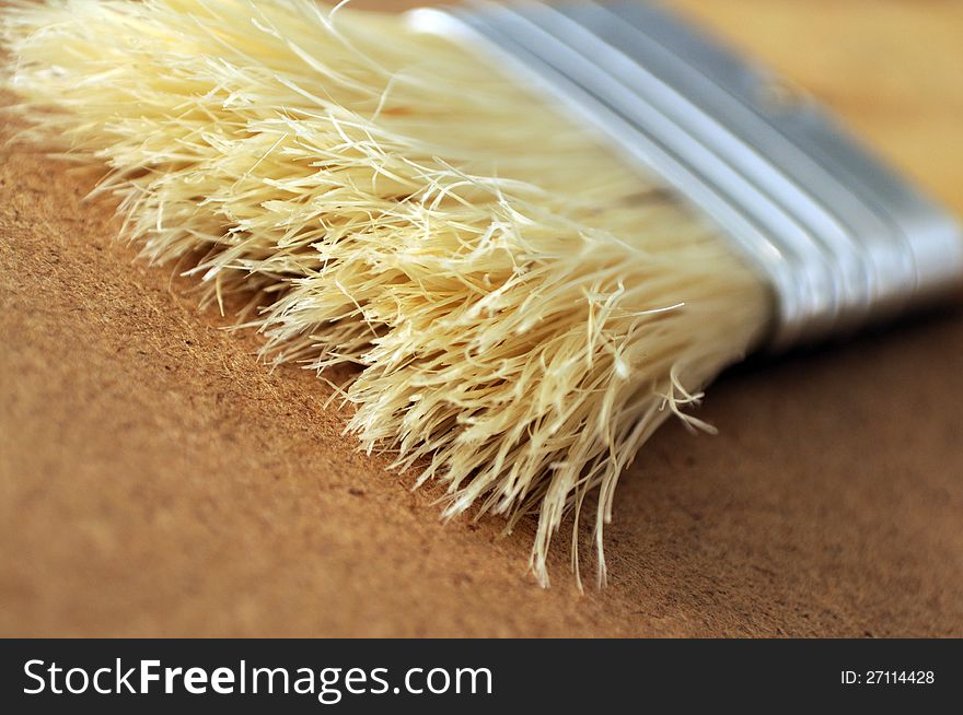 Macro of light brown paintbrush bristles