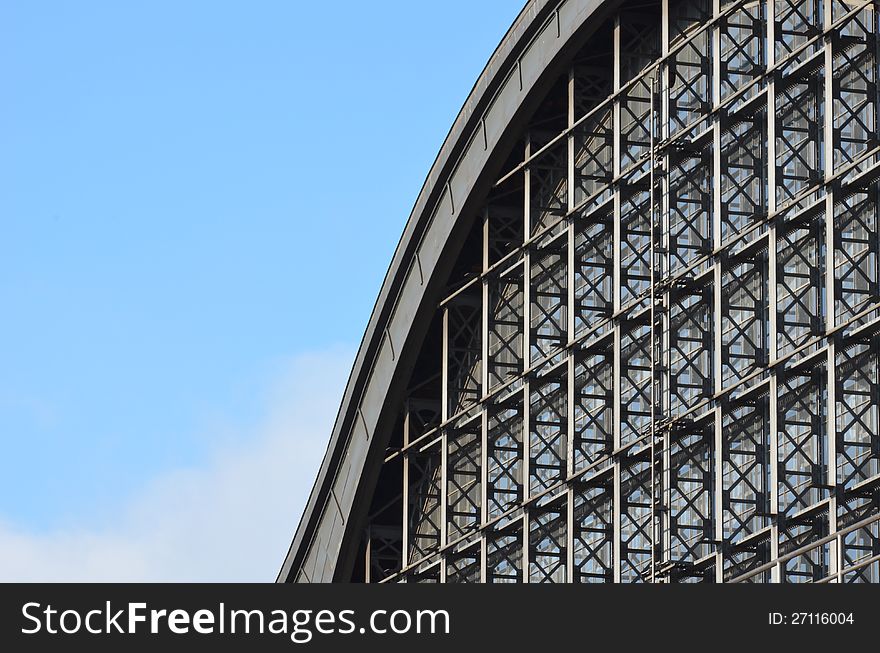 The steel structure gable of the Hamburg Dammtor railway station is seen against the light blue sky. The steel structure gable of the Hamburg Dammtor railway station is seen against the light blue sky