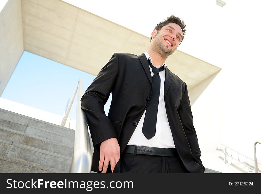 Attractive young businessman smiling