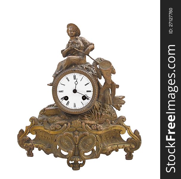 Antique fancy figured French brass table clock, with a young boy sitting on top holding a net. Isolated on white. Antique fancy figured French brass table clock, with a young boy sitting on top holding a net. Isolated on white.