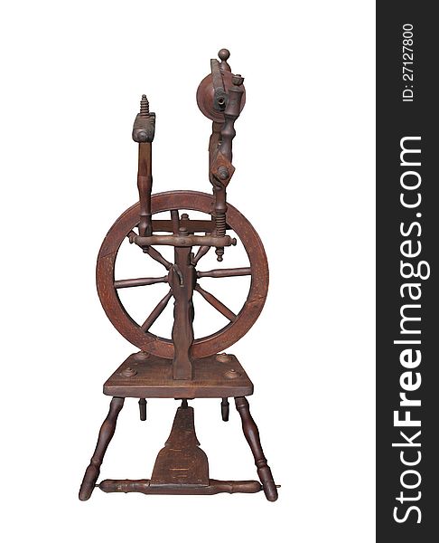 Small antique spinning wheel isolated.