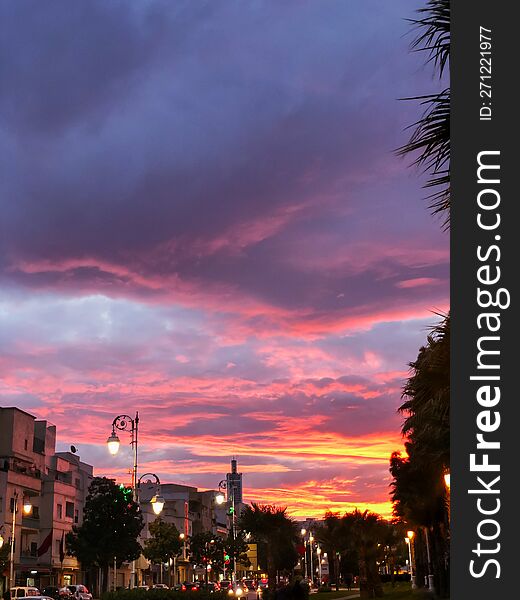 Melancholic mood of a cloudy city evening, evoking a sense of stillness amidst the urban landscape