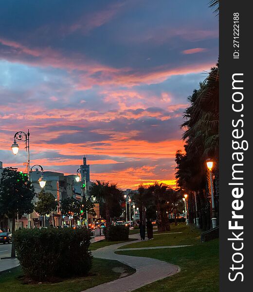 Mesmerizing beauty of cloudy skies over the city during an evening, painting a picturesque urban landscape