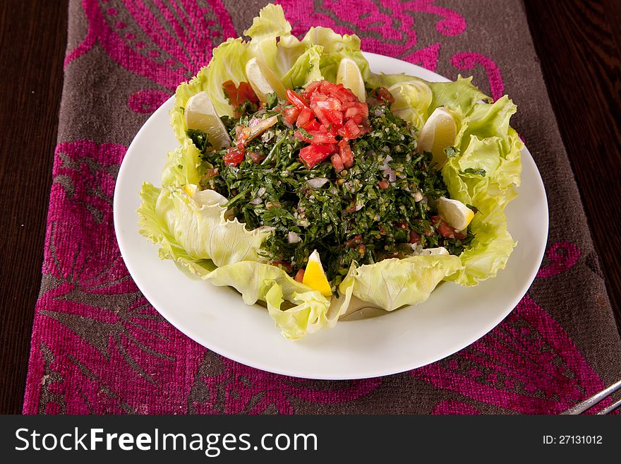 Salad with mixed lettuce, ham, olives, Lemon, avocado, cherry tomatoes, and a creamy dressing. Salad with mixed lettuce, ham, olives, Lemon, avocado, cherry tomatoes, and a creamy dressing.