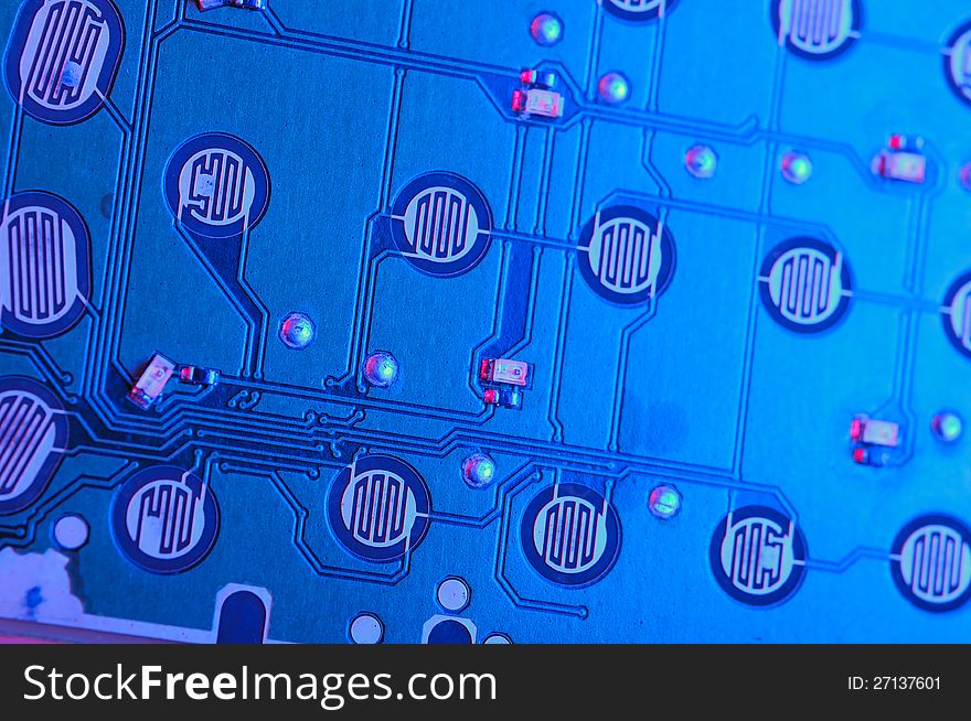 A close-up of blue mobile phone circuit board. A close-up of blue mobile phone circuit board