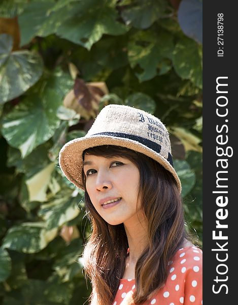 Portrait Of Asian Young Woman In garden in winter season