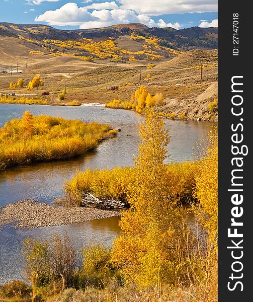 Golden yellow landscape with rivers and moutainside views in Colorado. Golden yellow landscape with rivers and moutainside views in Colorado