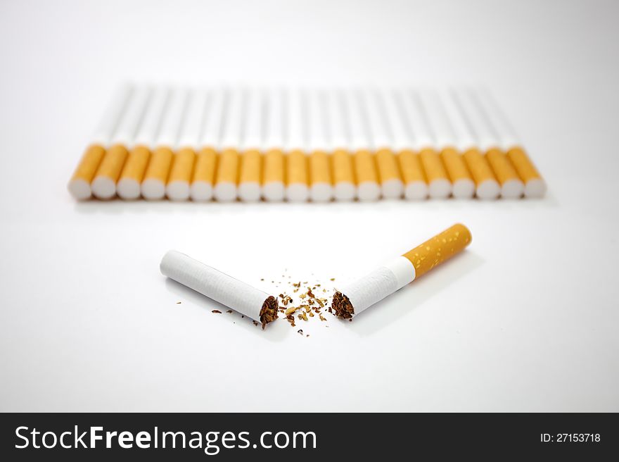 Cigarettes is not good for healthy that is photo idea and photo cigarettes on white background