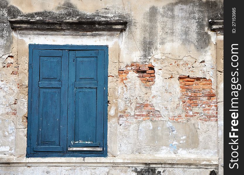 Exterior with rural window on brick wall