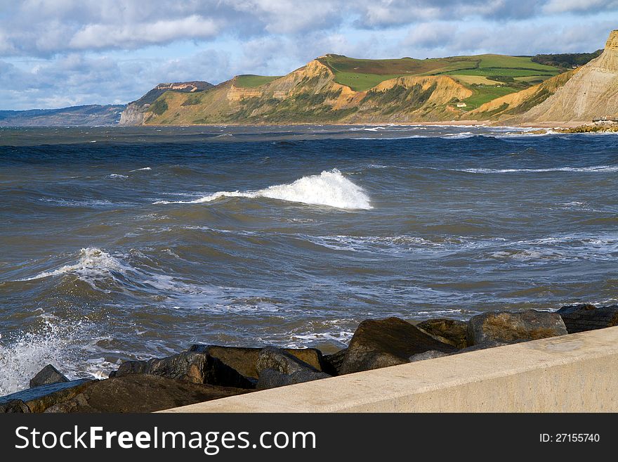 Dorset coastline from West Bay harbour wall including Ridge Cliff, Doghouse Hill and Thorncombe Beacon