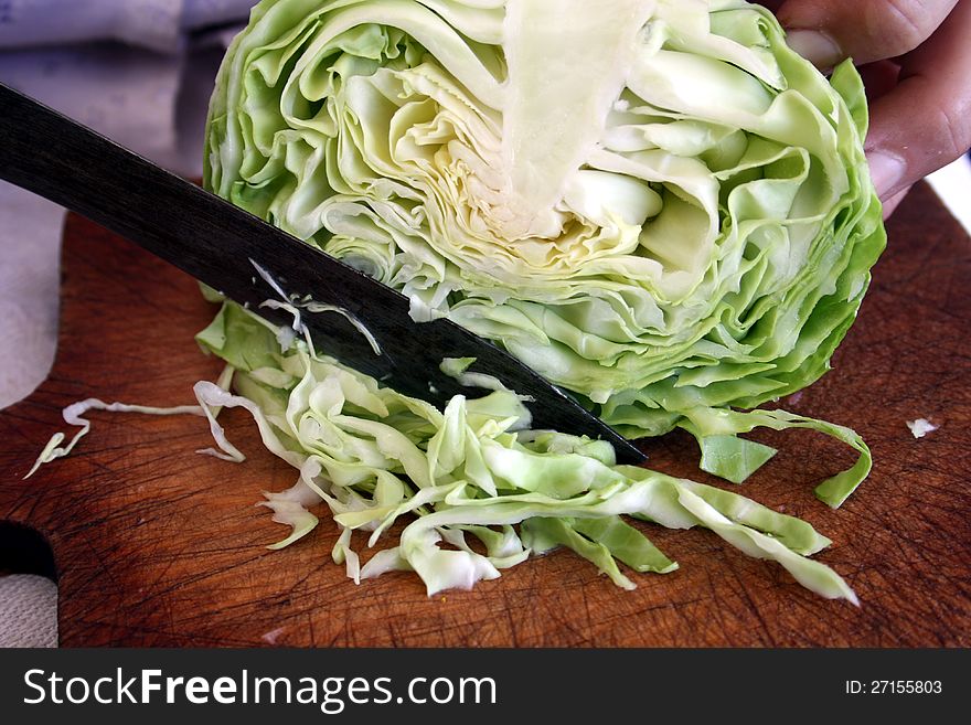 Cutting of cabbage for salad