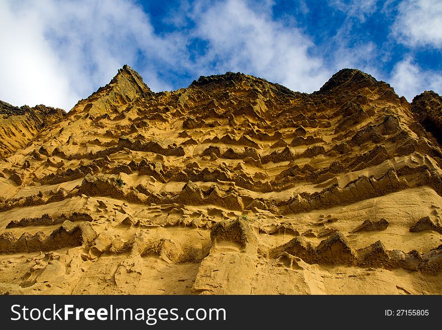 Sandstone Cliffs And Blue Sky