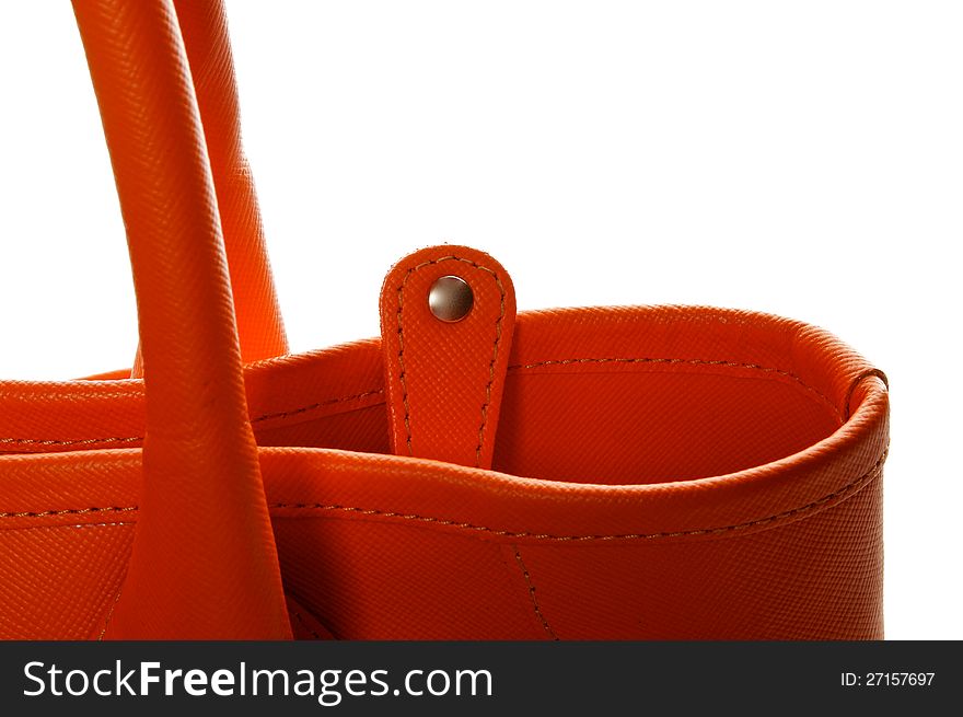 Details of Women's Ginger Handbag: Handles and Zipper tab closeup isolated on white background. Details of Women's Ginger Handbag: Handles and Zipper tab closeup isolated on white background