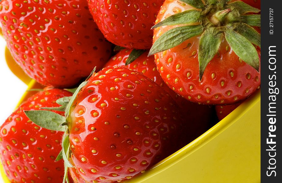 Perfect Raw Strawberries in Yellow Bucket closeup