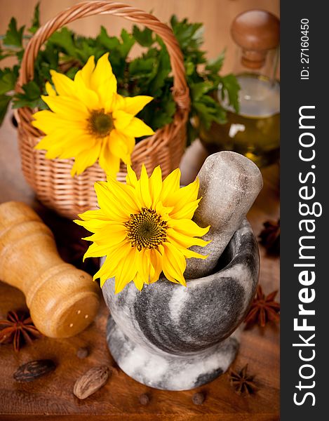 Spices And Flower Sunflower In A Mortar