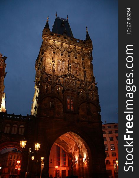 Classical gothic architecture. Night urban scene with ancient tower. Prague,Czech Republic. Classical gothic architecture. Night urban scene with ancient tower. Prague,Czech Republic