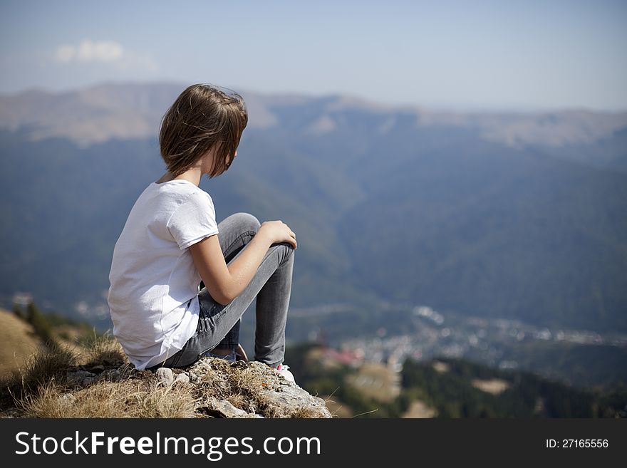 Teenager woman admiring mountain