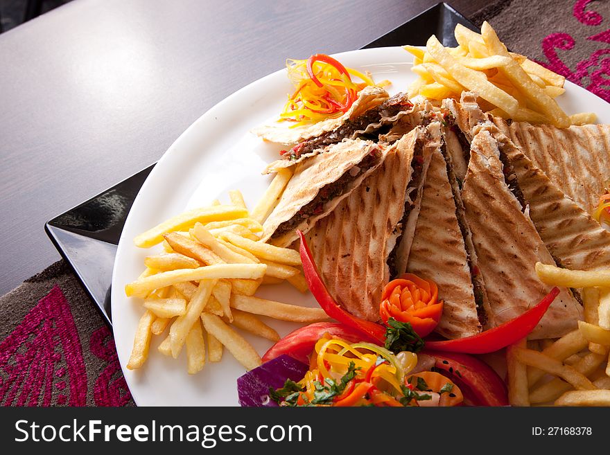 Delicious sandwich and fries, shallow depth of field. Delicious sandwich and fries, shallow depth of field
