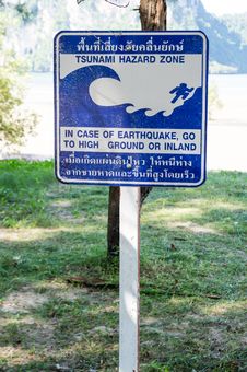 Tsunami Warning Sign On The Beach Stock Photo Tsunami Warning Sign On The Beach Stock Photo