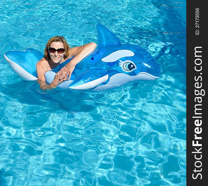 Beautiful Woman In A Swimming Pool