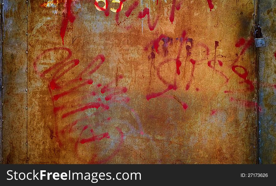 Old metal surface covered with several peeling layers of paint. Old metal surface covered with several peeling layers of paint