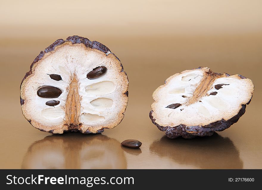 Dried custard apples on beige background. Dried custard apples on beige background.