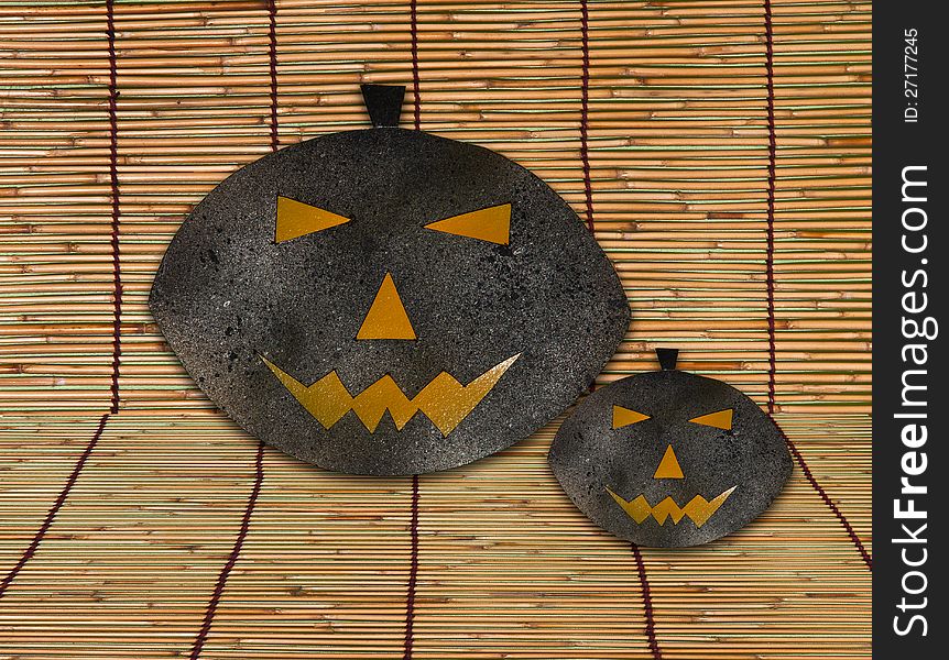 Two Halloween Pumpkins isolated on brown walls background. Two Halloween Pumpkins isolated on brown walls background.