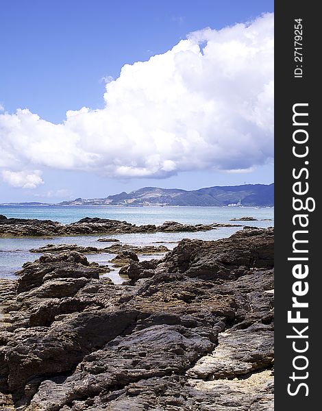 Rocks along the shoreline of an Okinawan beach. Rocks along the shoreline of an Okinawan beach.