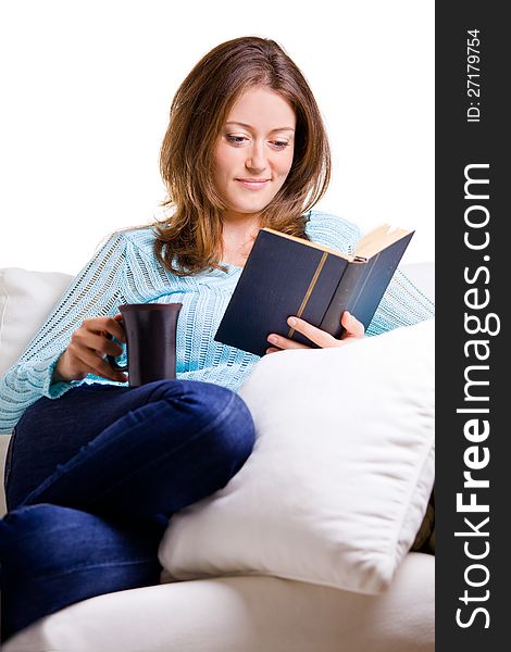 Attractive Young Woman Reading A Book