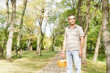 Man With Basket Of Fresh Apples Stock Photos