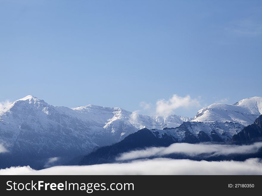 White clouds flying on carpathian mountains range landscape. White clouds flying on carpathian mountains range landscape
