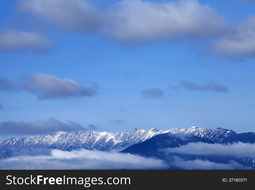 White clouds flying on carpathian mountains range landscape