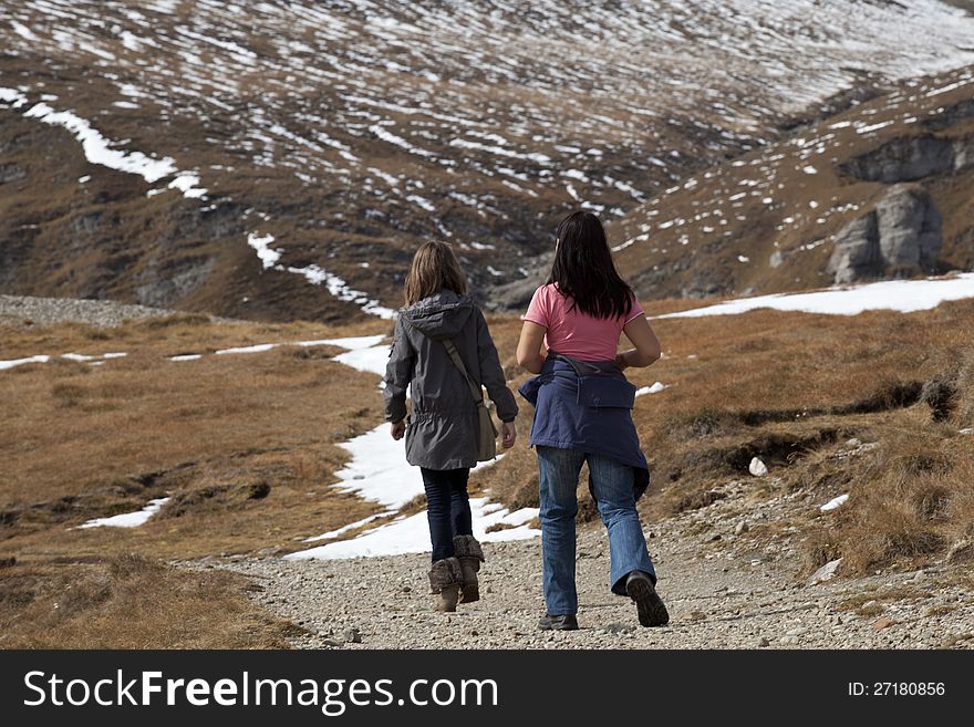 Two tourists visiting mountains