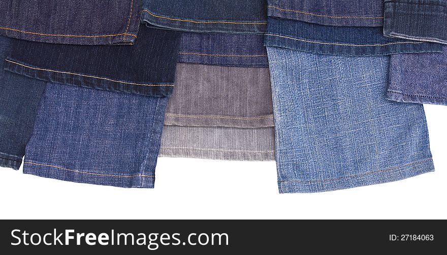 Isolates of leg jeans from the garment, which overlap in many of thirteen pieces. Isolates of leg jeans from the garment, which overlap in many of thirteen pieces.