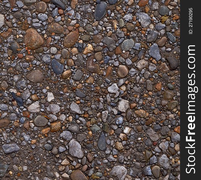 Roundish pebble stone gravel texture or background. Roundish pebble stone gravel texture or background