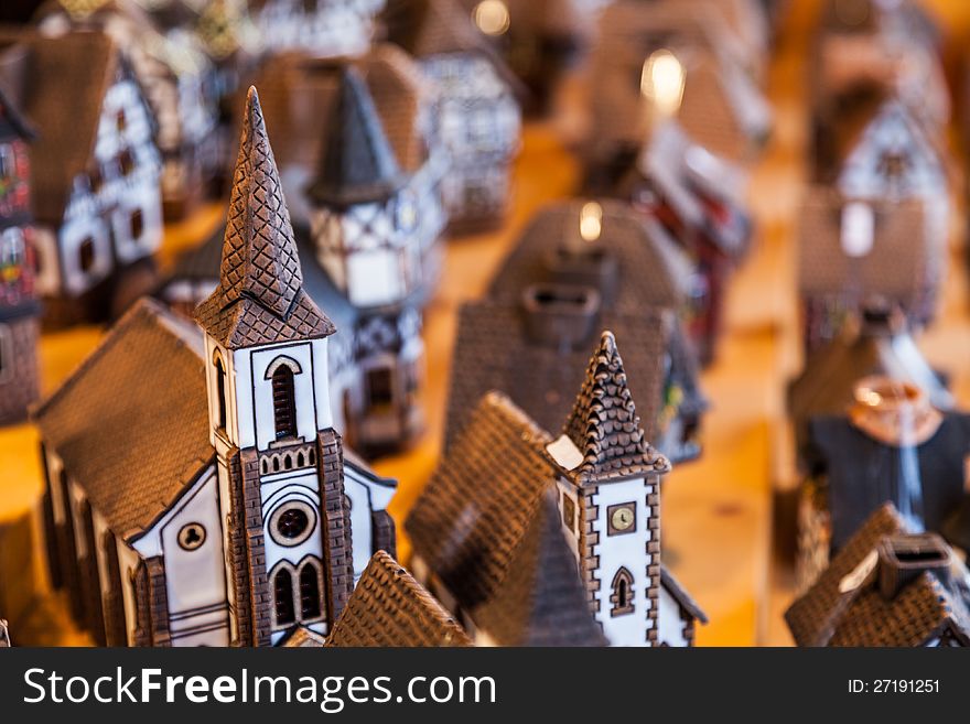 Specific Alsatian miniature ceramic houses on a souvenirs market stand in Alsace, France. Specific Alsatian miniature ceramic houses on a souvenirs market stand in Alsace, France.