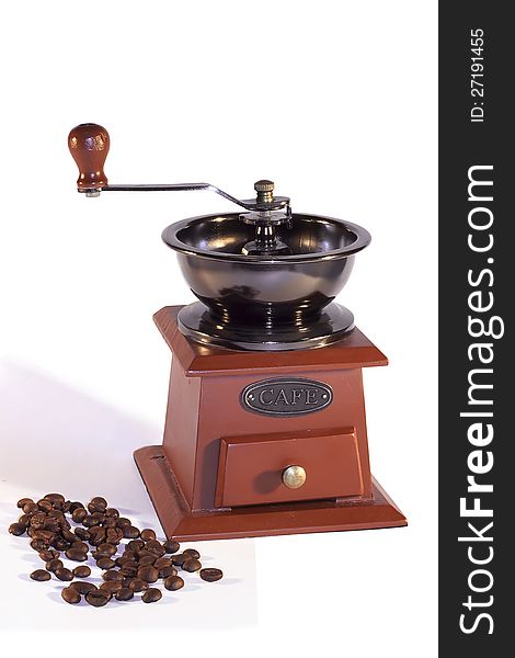 Vintage coffee mill on white