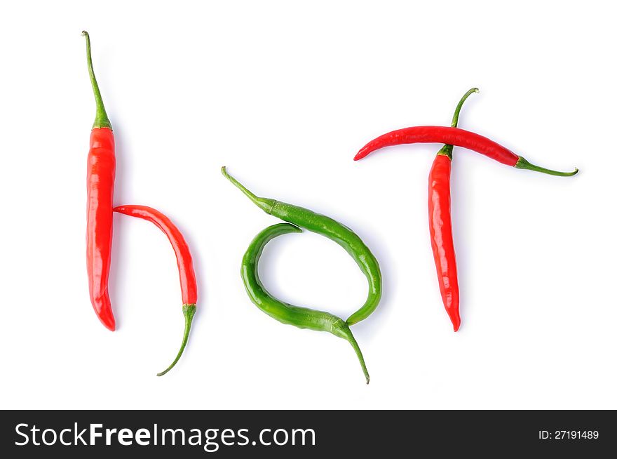 Hot written with peppers isolated over white