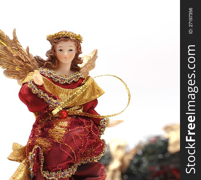 Statue of Christmas Angel in golden clothes