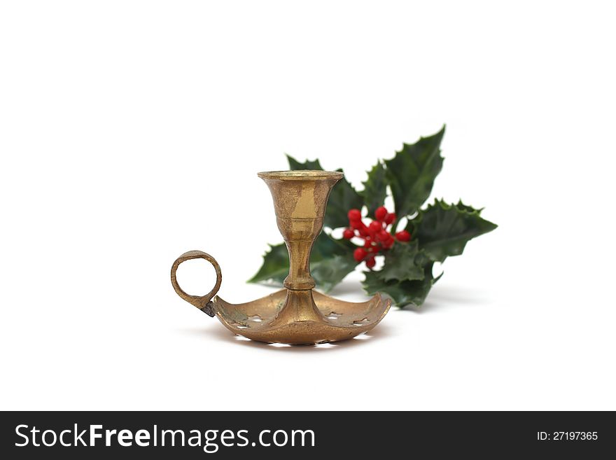 Vintage candlestick with holly berry,  on white