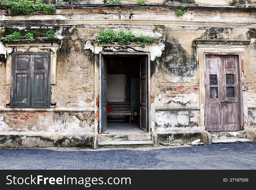 Old door and window of brick building