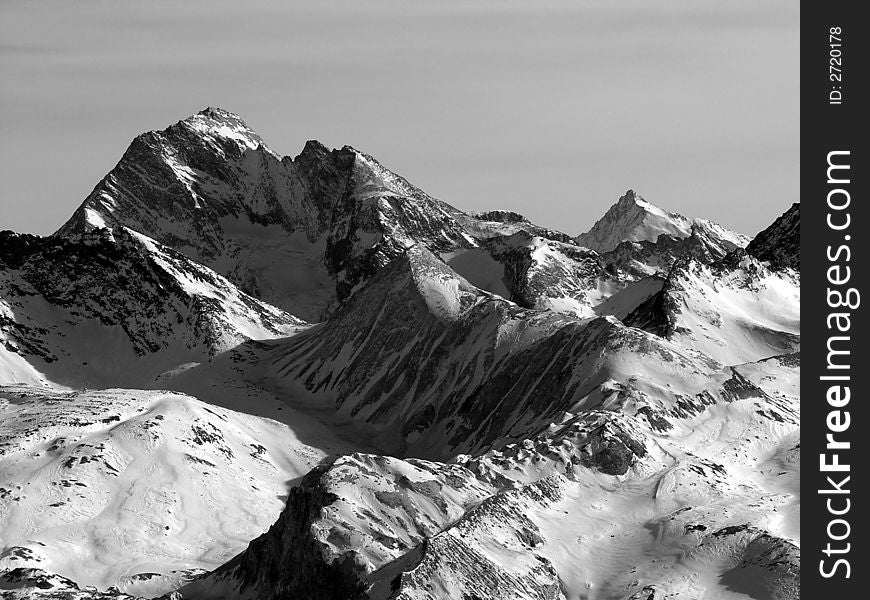 Winter panorama of snow-covered peaks of french alps