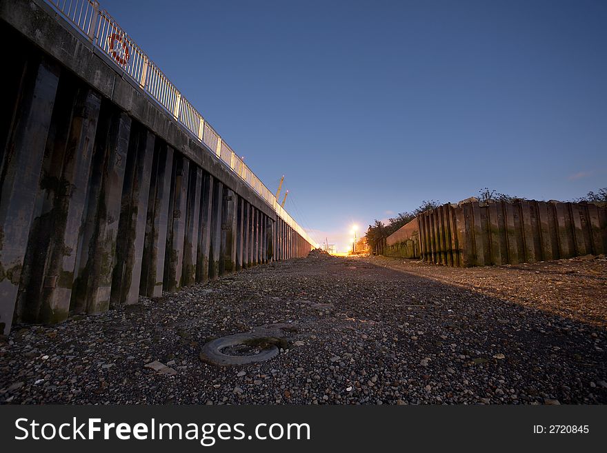 Thames riverbank at night showing the wharf