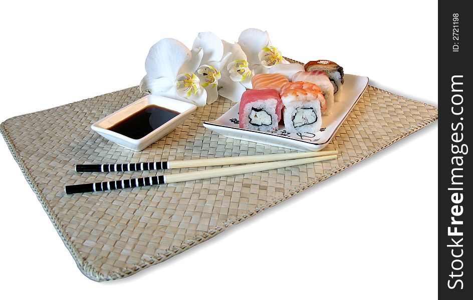 Rolls on bamboo mat. The Japanese meal